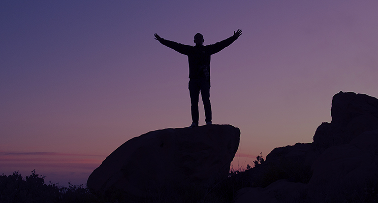person silhouette at dusk
