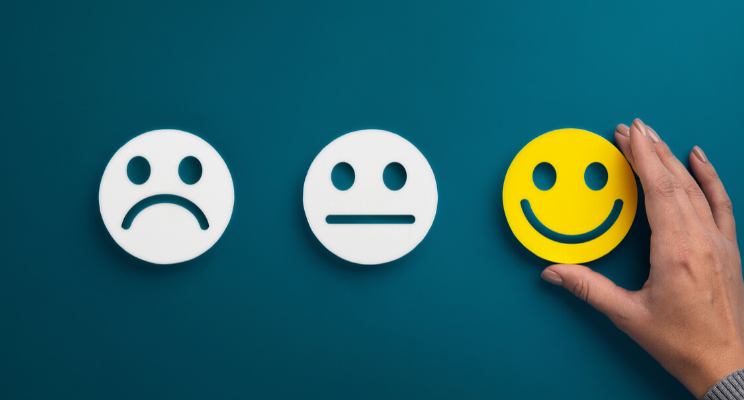 row of faces with varying expressions
