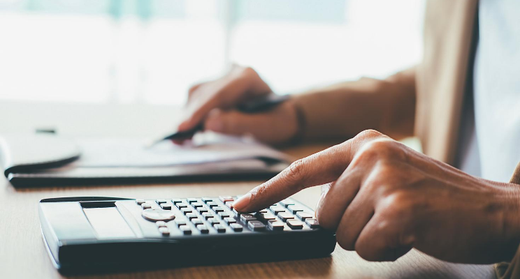 typing on a calculator