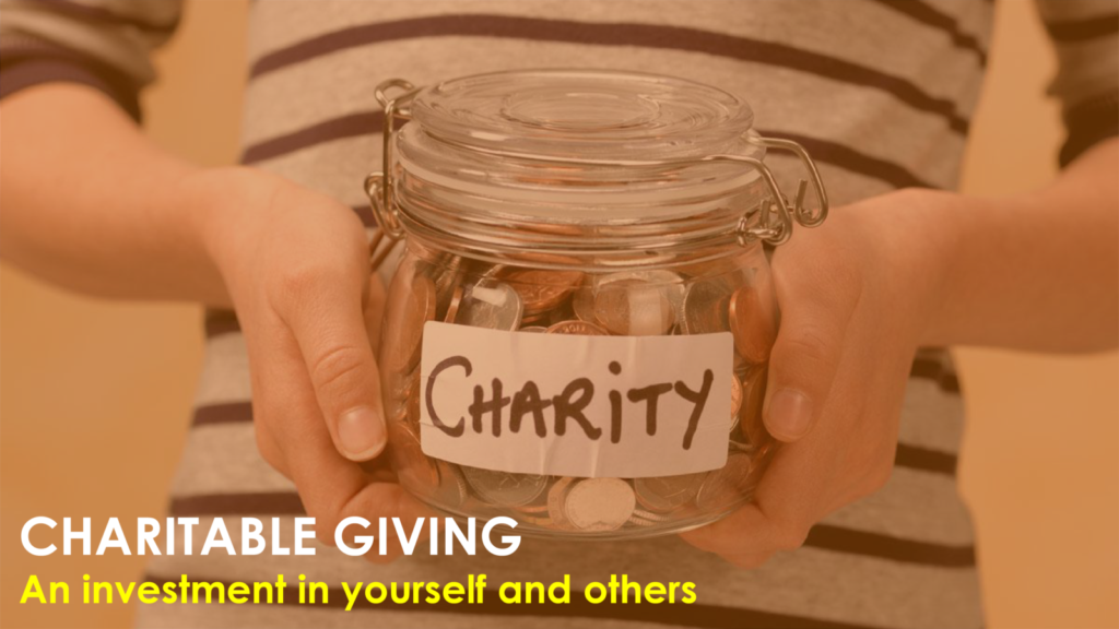 person holding jar with charity written
